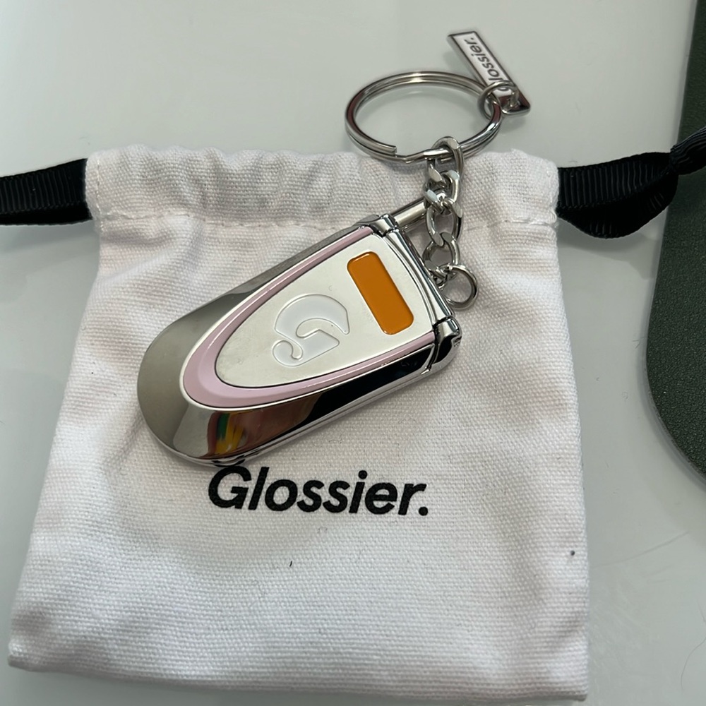 Glossier cellphone keychain